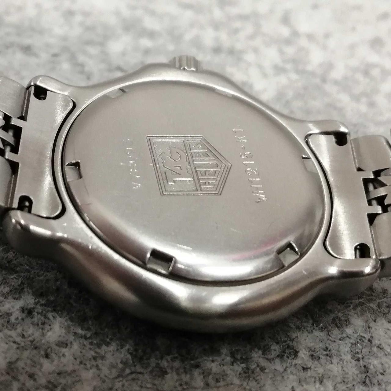 TAG Heuer アナログクォーツ腕時計 TAGHEUER◇クォーツ腕時計/アナログ/ステンレス/WHT/SLV TAG HEUERタグ