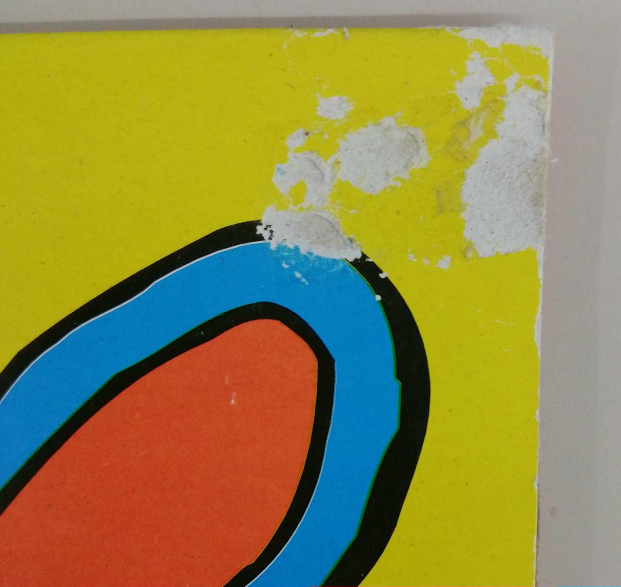 ジャケット右上端傷みあり