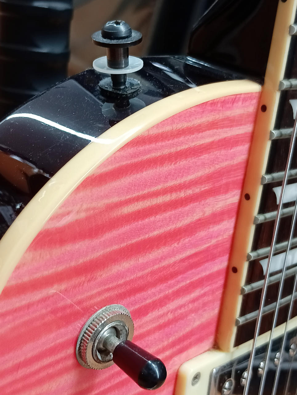 ストラップピンロック式に変更