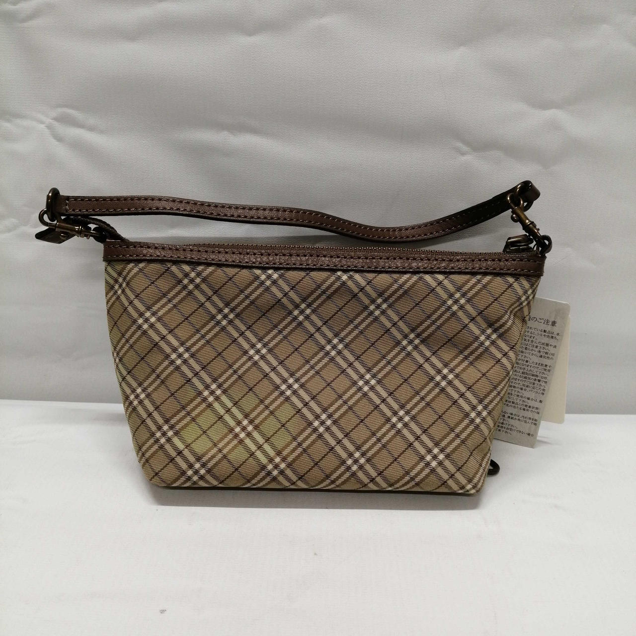 正面左側下に変色あり