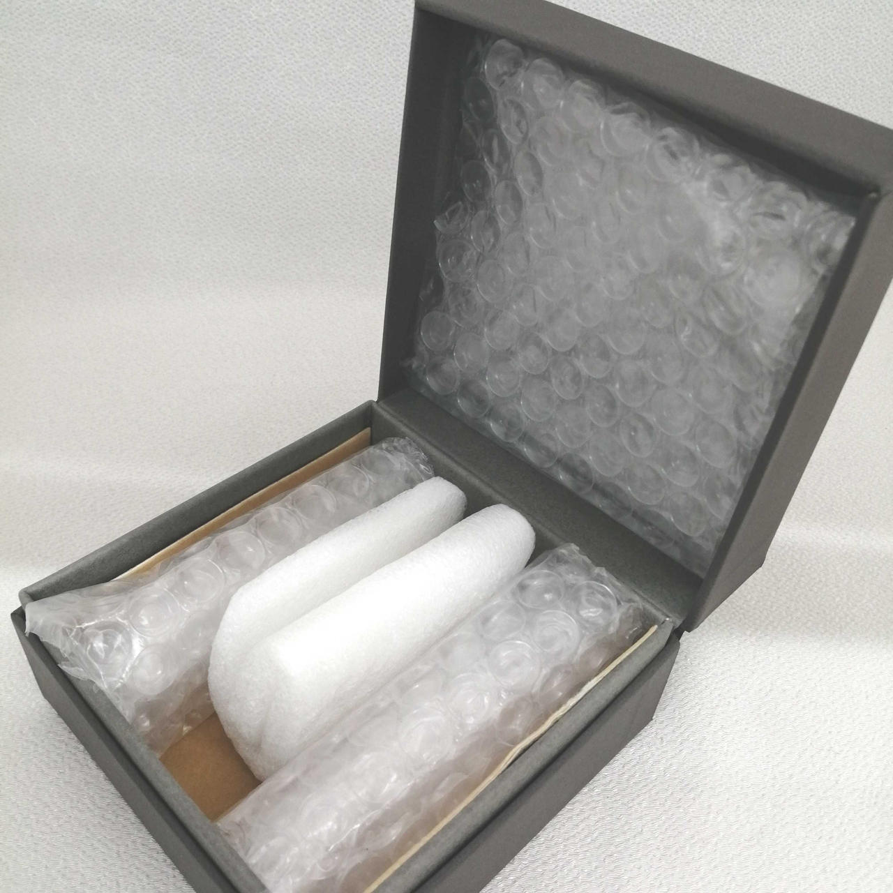 化粧箱内のクッション欠品