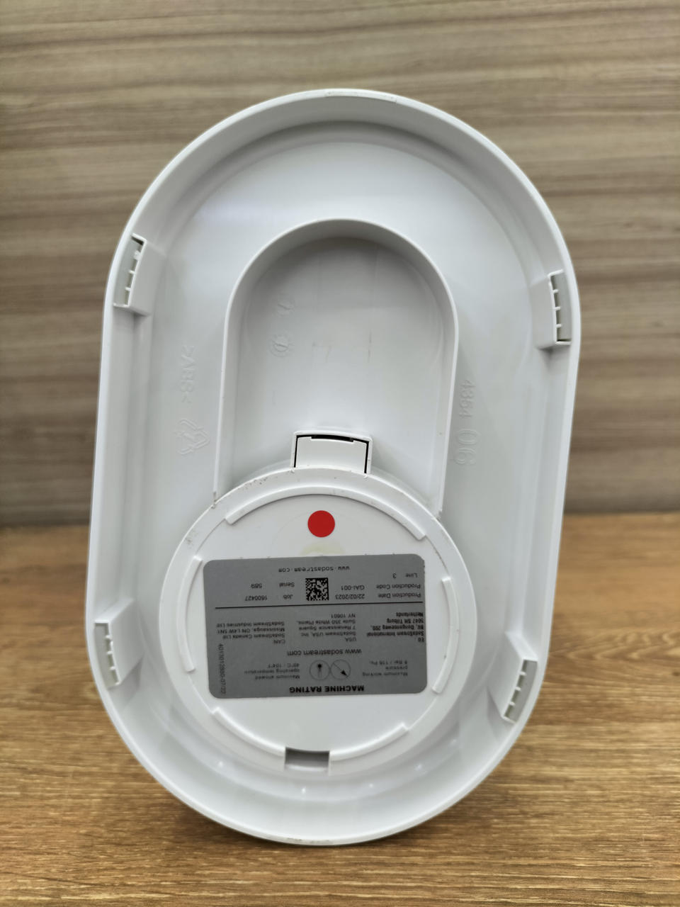 赤丸のシールの下に汚れあり