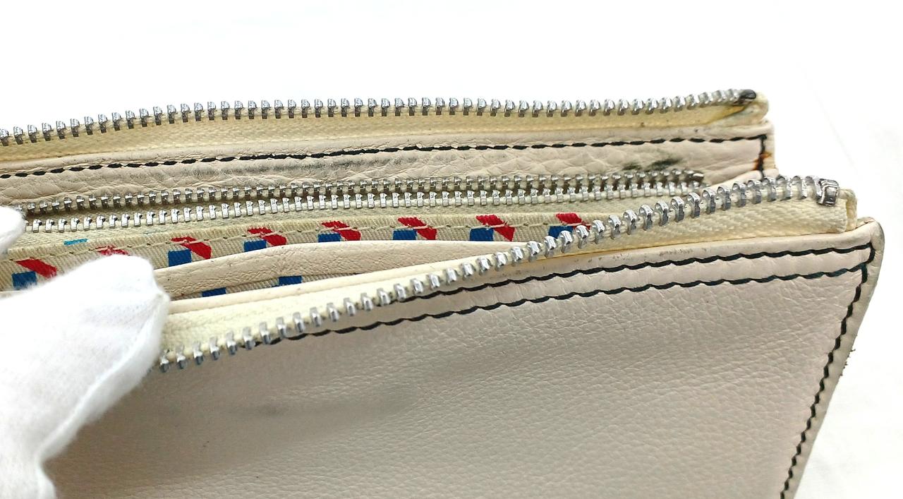 ファスナー部分黒ずみ、ボンド汚れあり