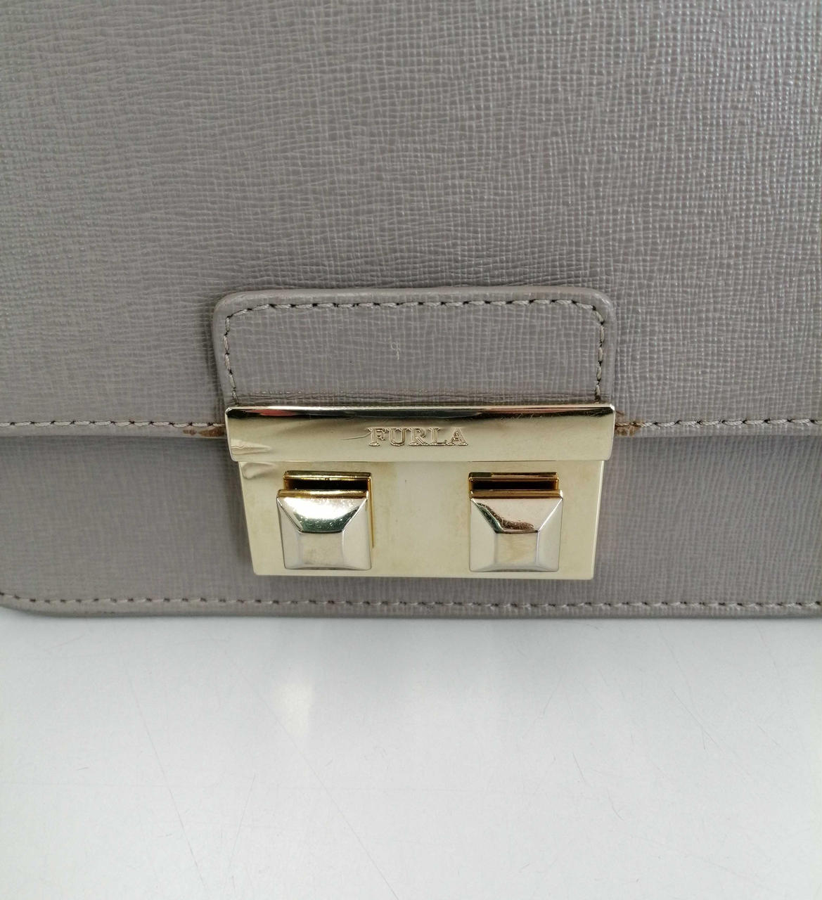 金具部分変色、キズあり