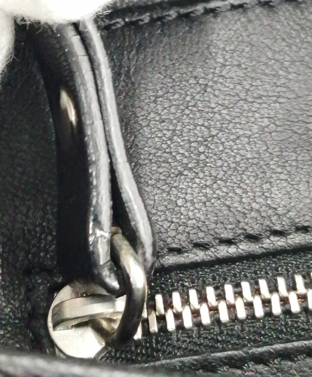 ファスナー引き手部分擦れあり