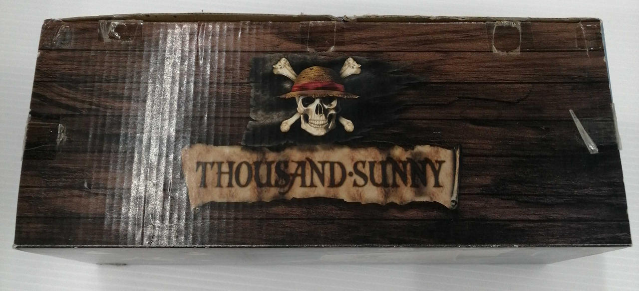 テープ剥がし跡あり