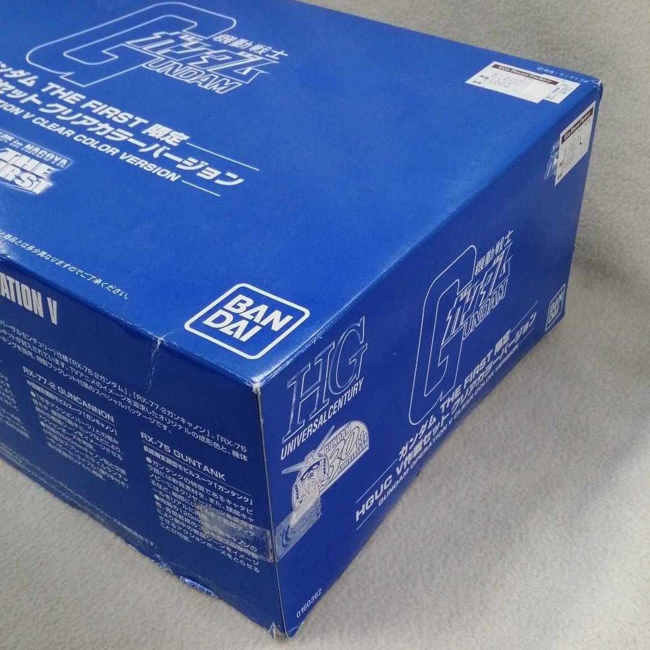 値札、テープ貼り付け