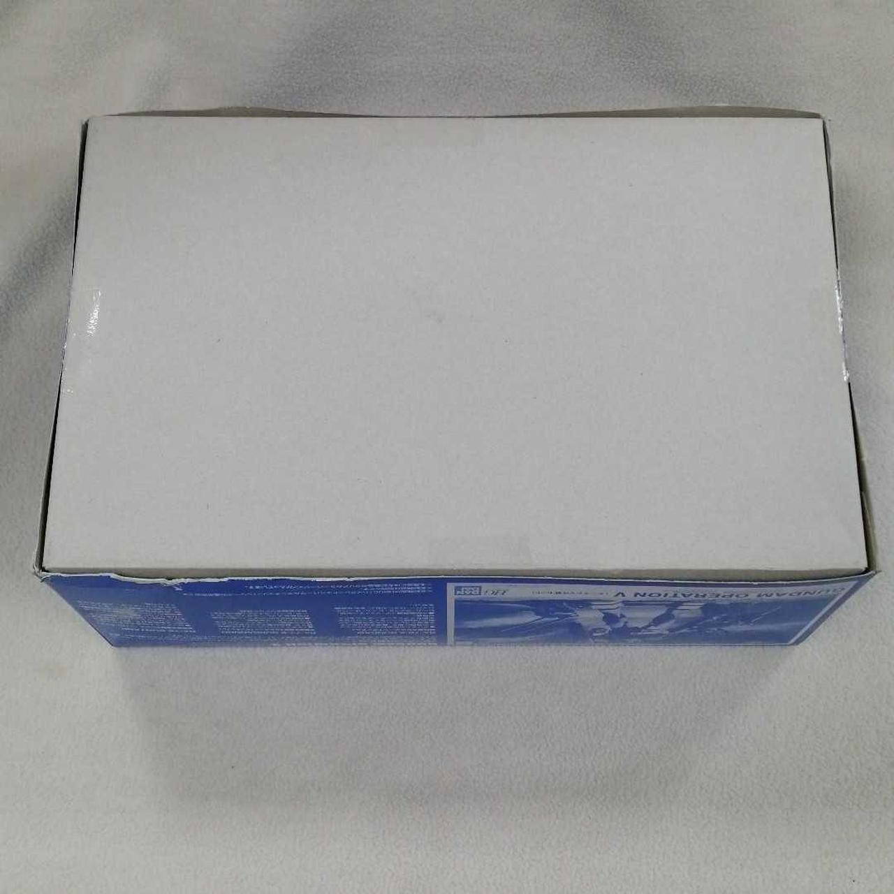 四カ所テープ貼り付け跡あり