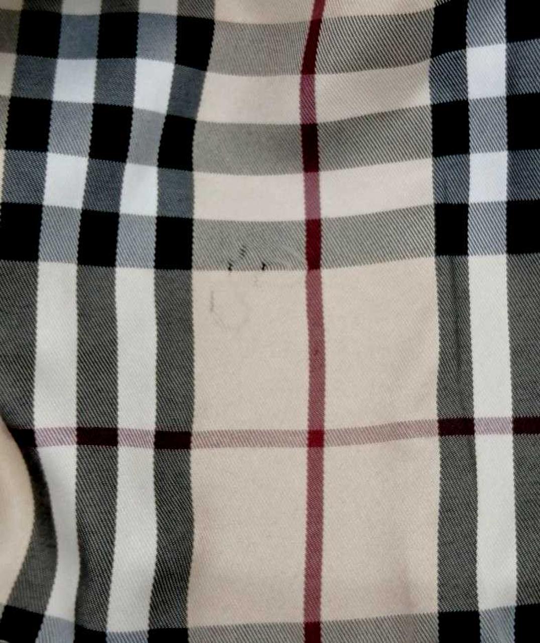 裾の裏地に傷み有り