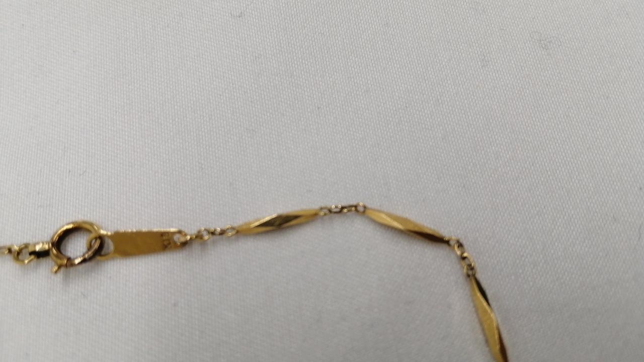 留め具(丸い方)は,K18ではありません