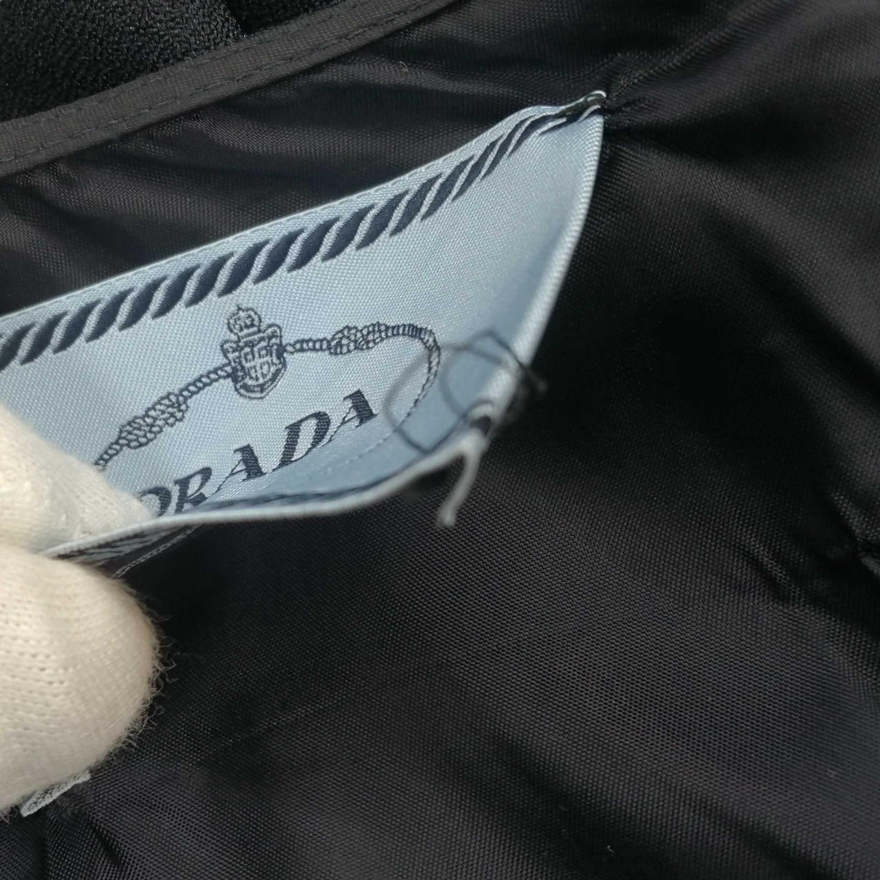 タグ糸2箇所取れてます。