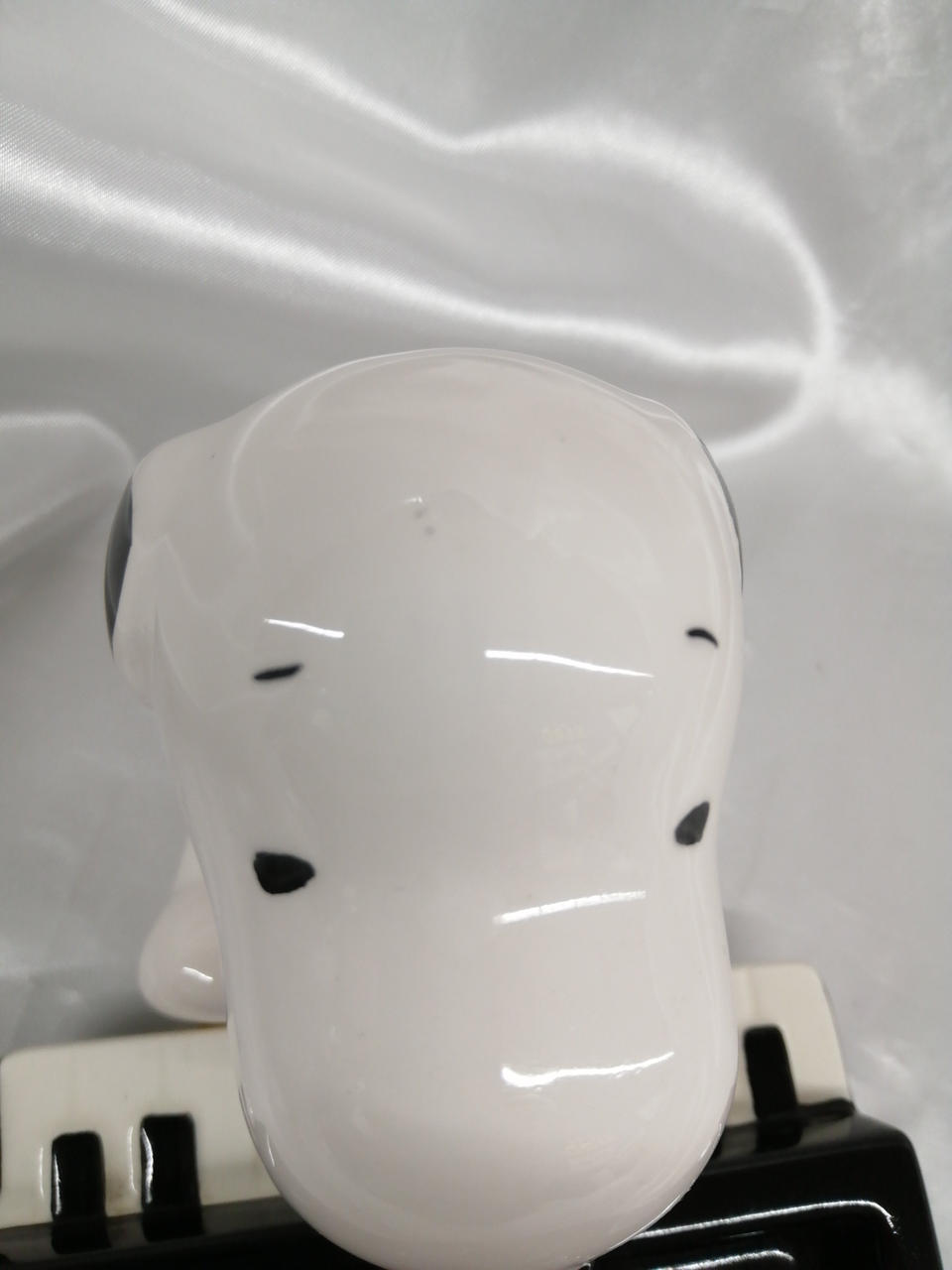 少しおでこに汚れあります