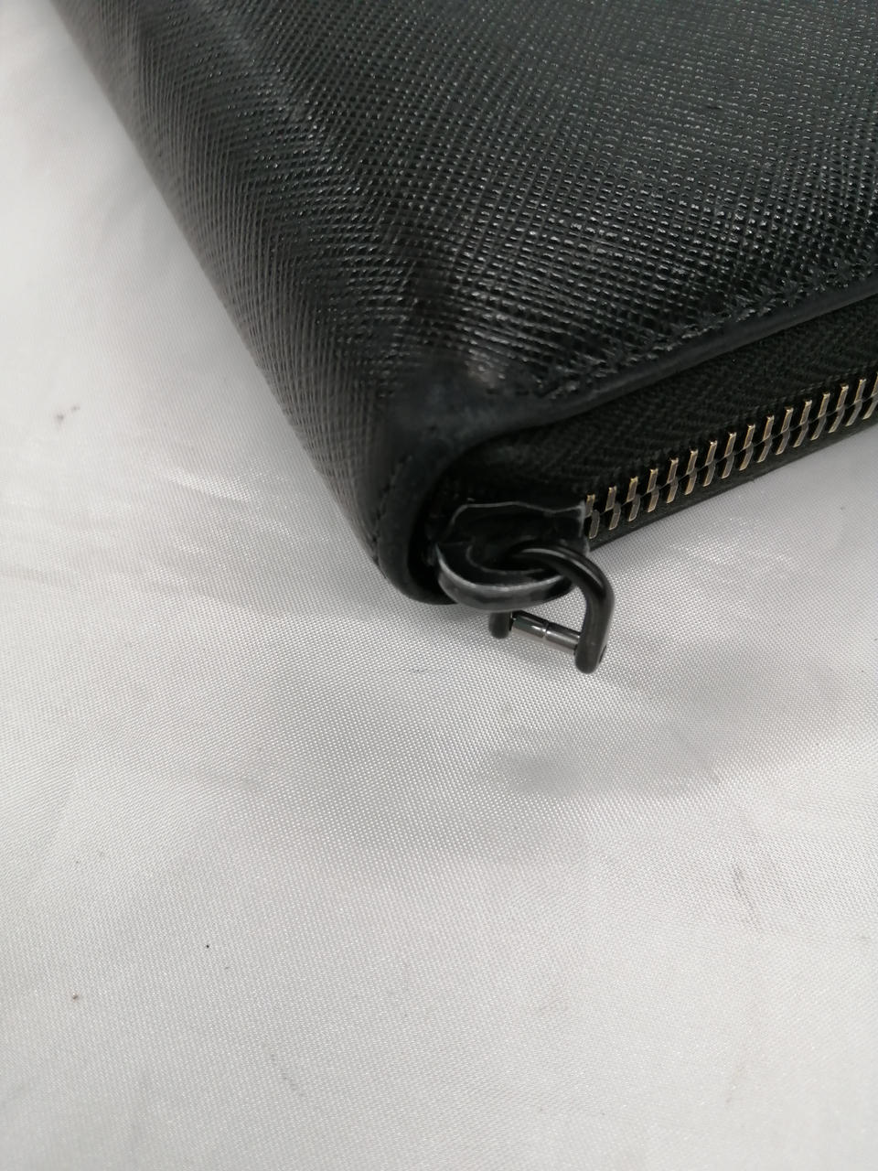 ファスナー引き手欠損