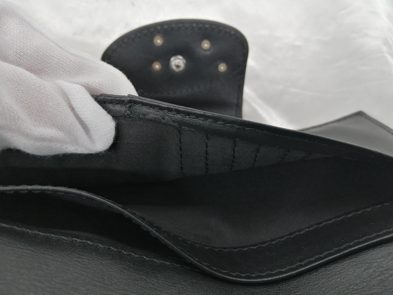 ポケット内側縁剥がれあり