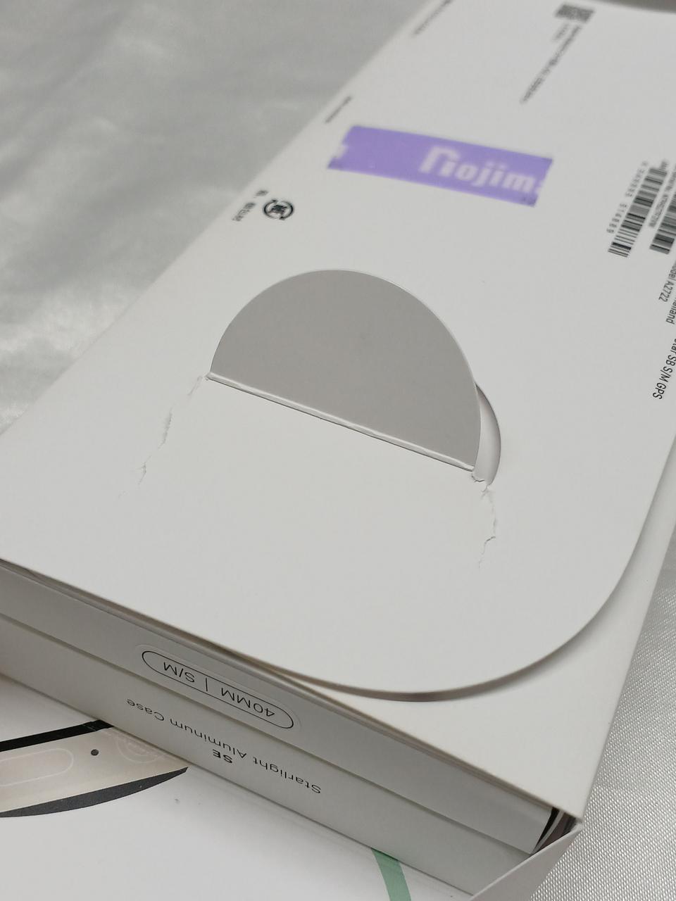 パッケージ固定部破れ有