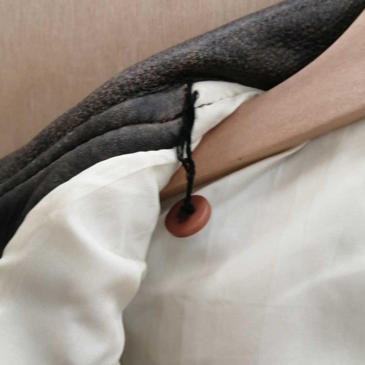 ボタン取れかけ