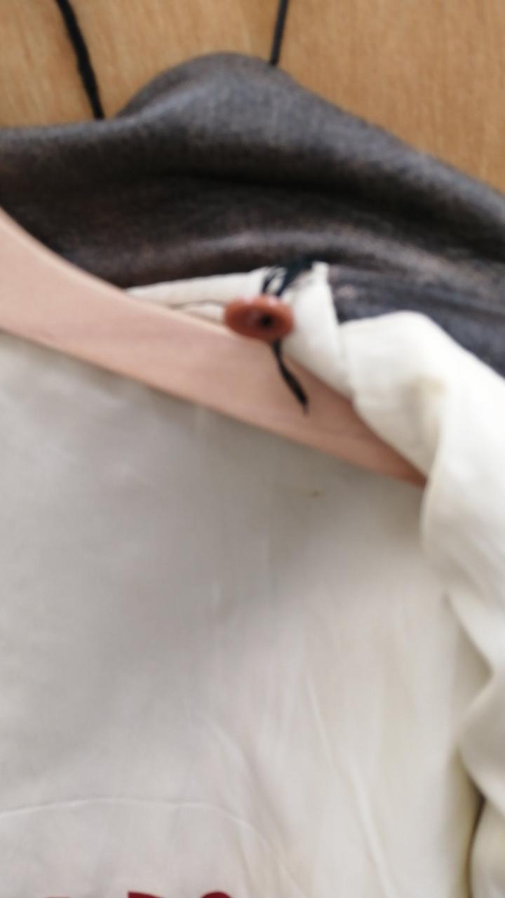 ボタン取れかけ