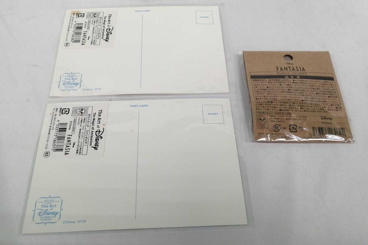 左下のポストカード裏面にシミあり