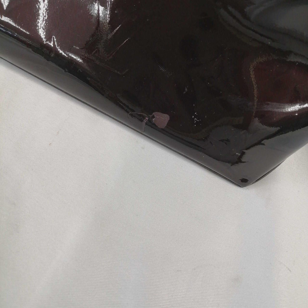 正面下部ダメージ部分