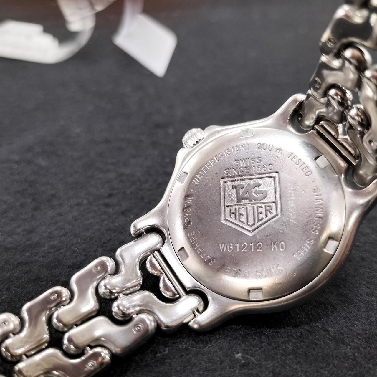 裏面擦り傷あり