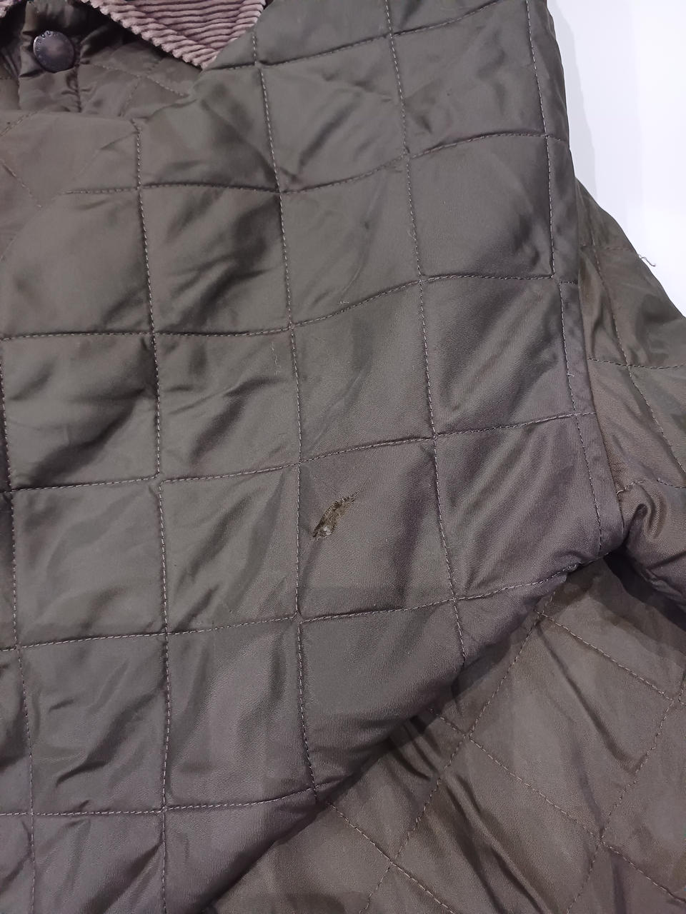 左腕破れあります。