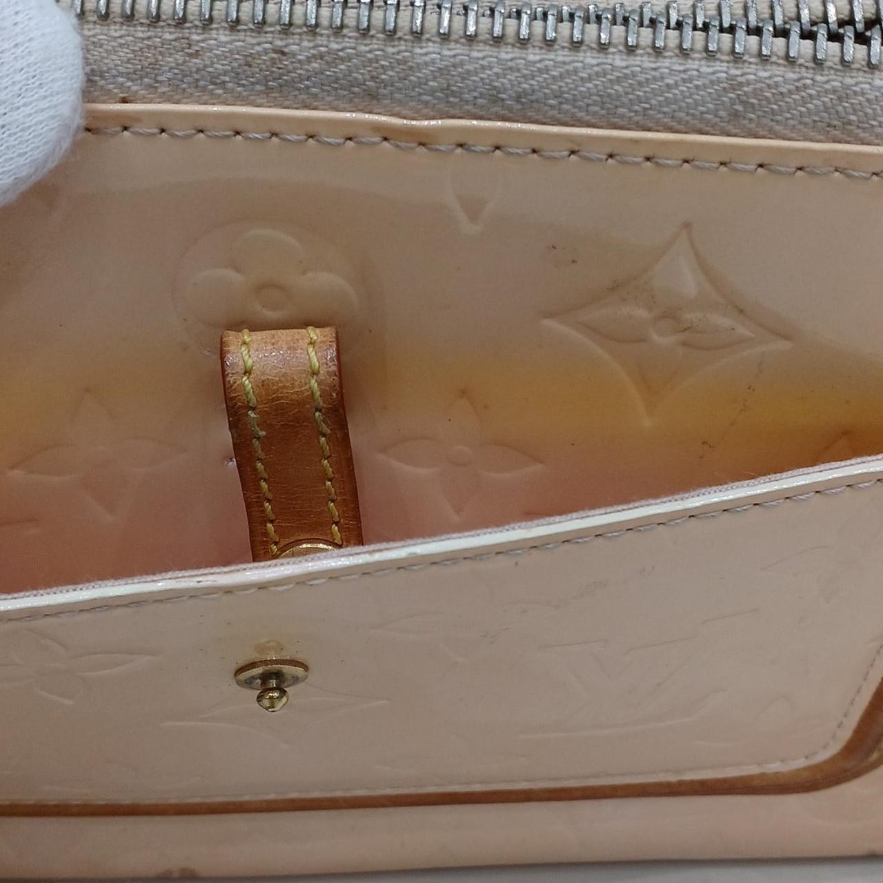 手前のポケット部分が色褪せしています