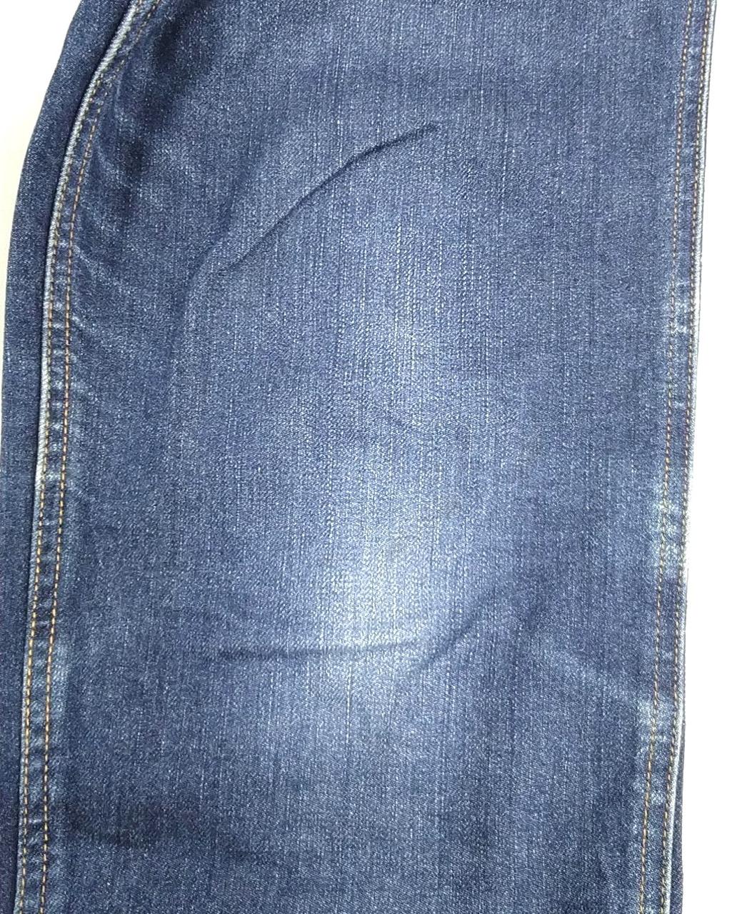 左膝に薄い汚れ有り。