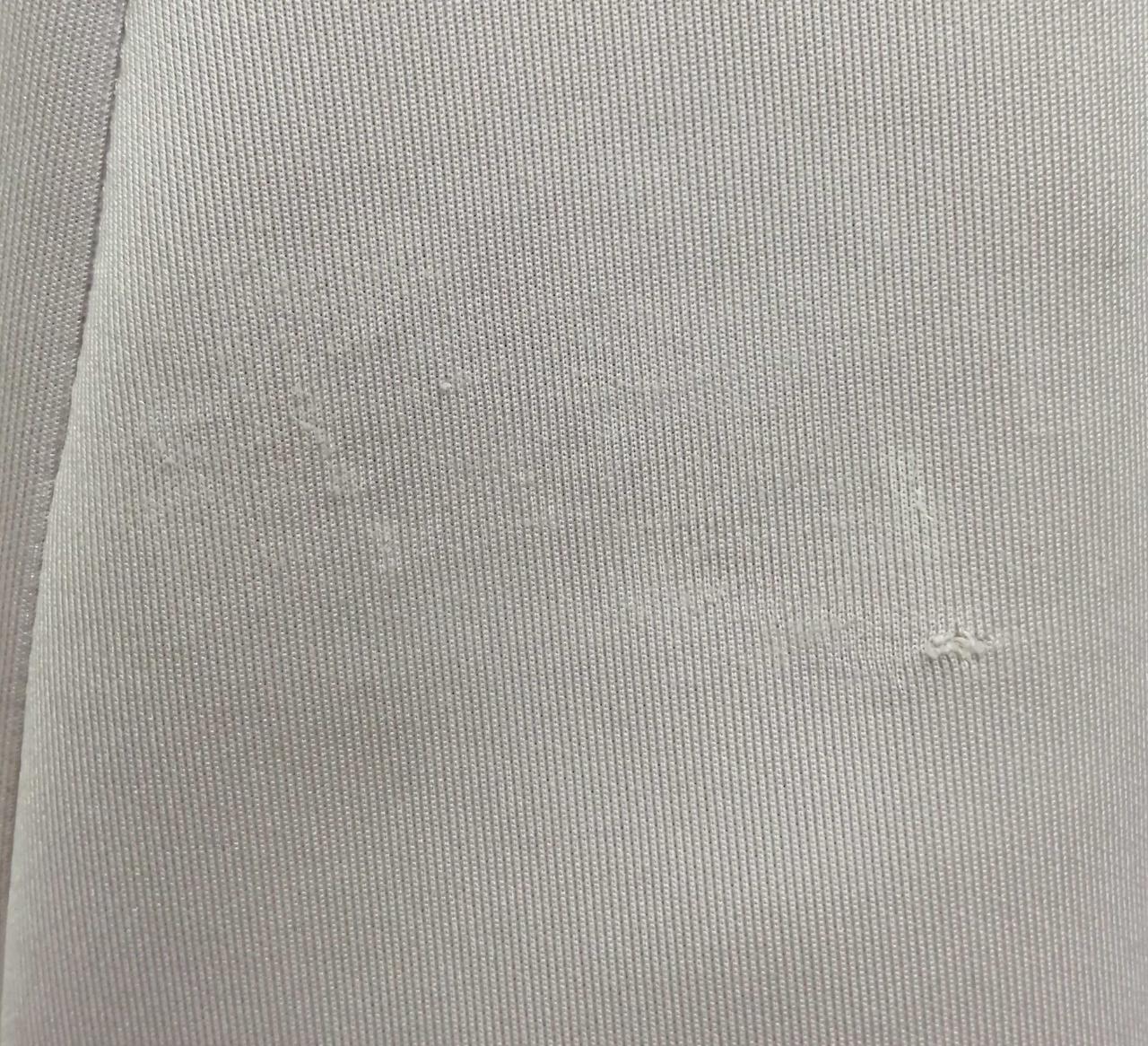 前身頃下部ダメージ