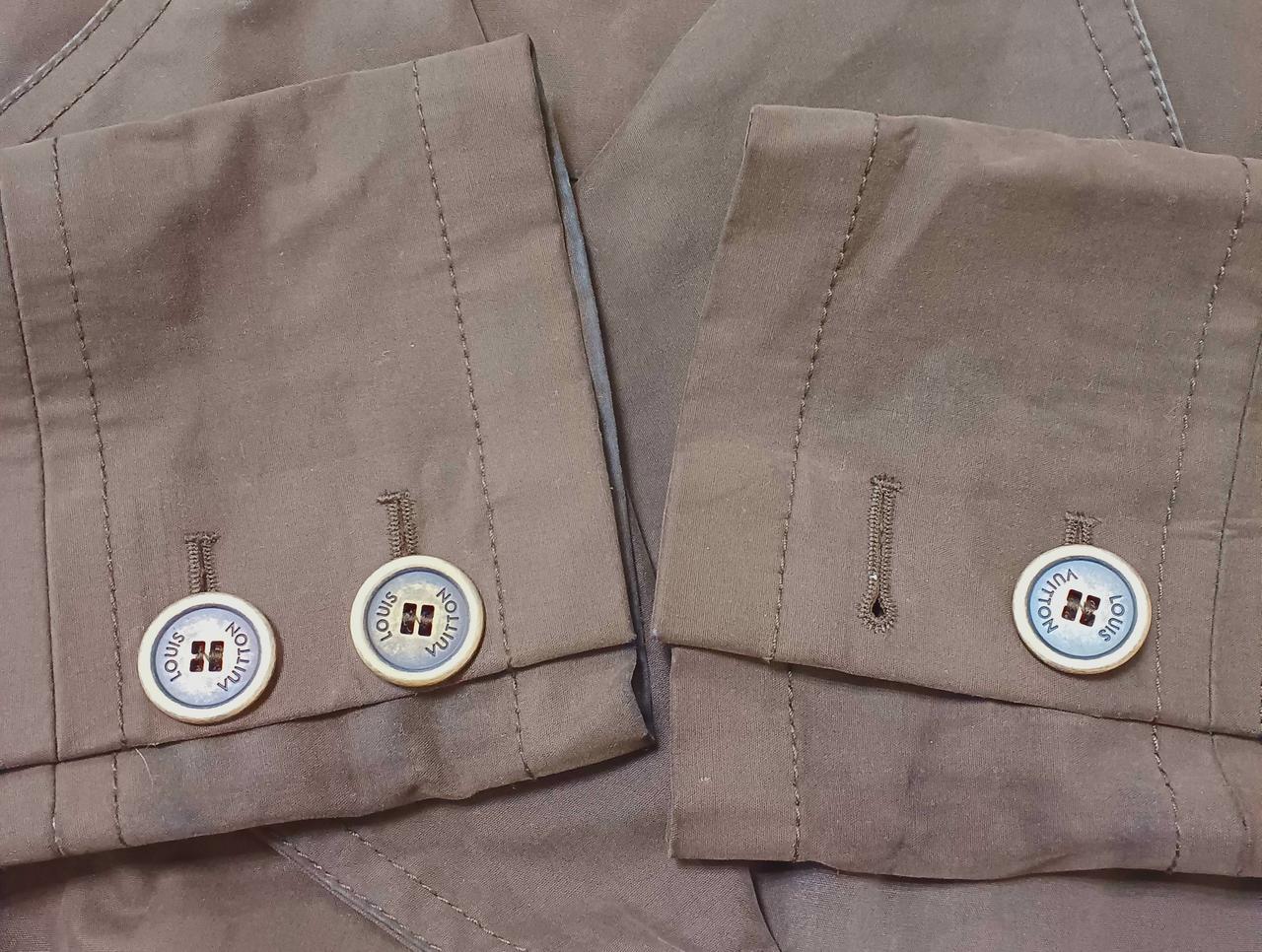 左袖ボタン１つ欠損