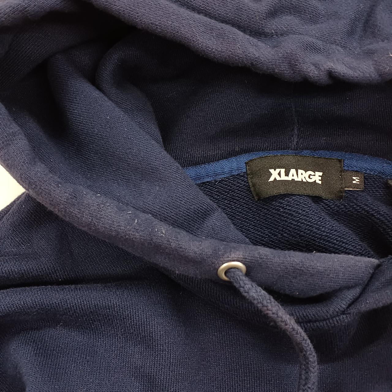 フードに色褪せ、毛玉あり