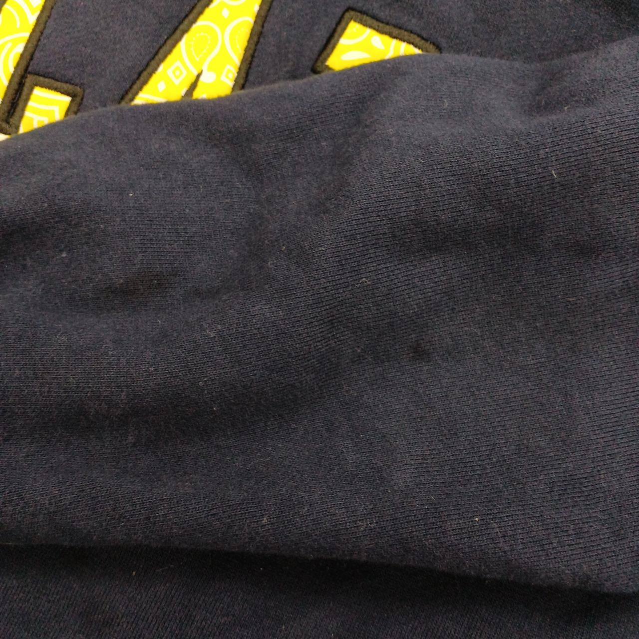 左袖にシミあり