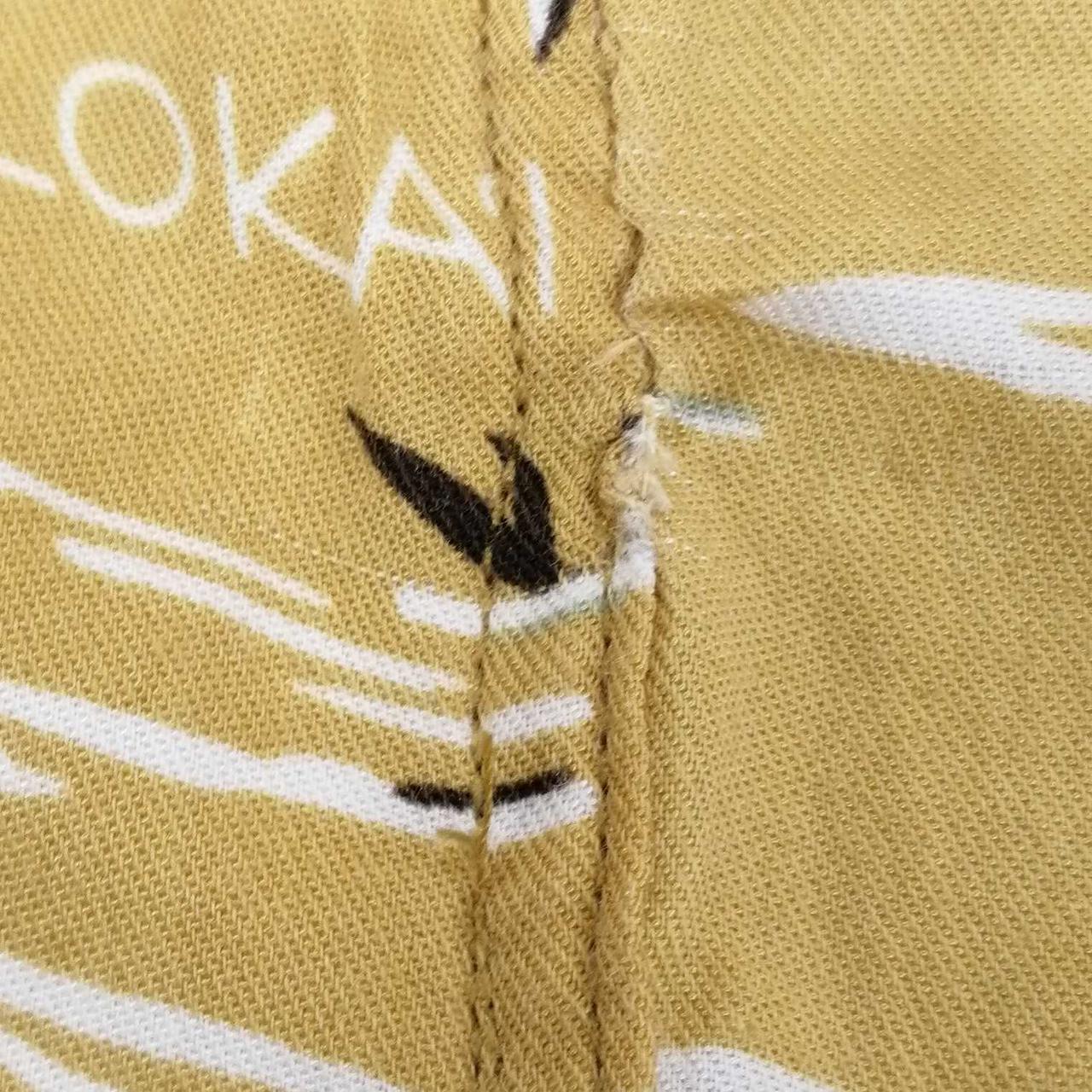 左裾付近補修跡有