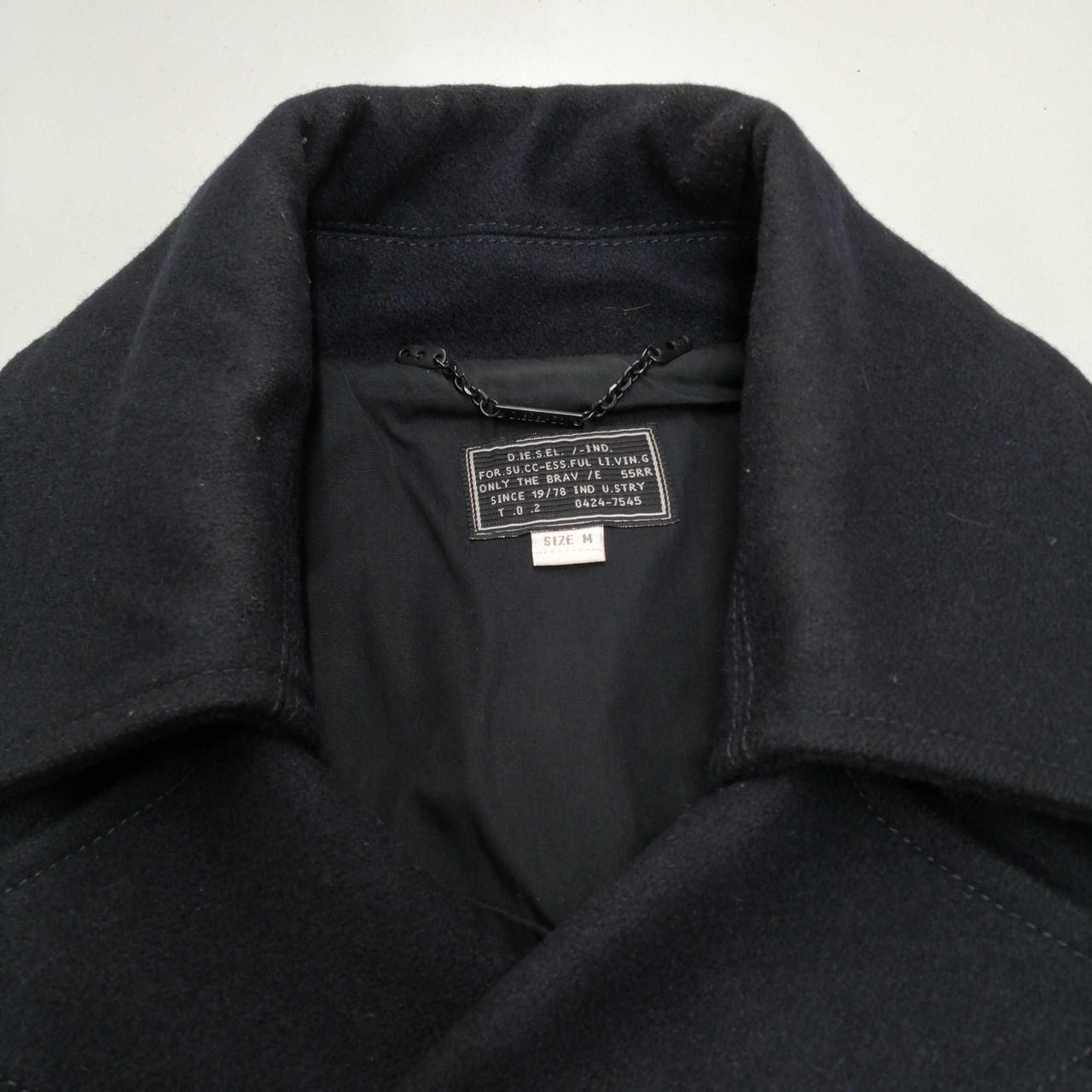 襟元汚れ(白く)あり