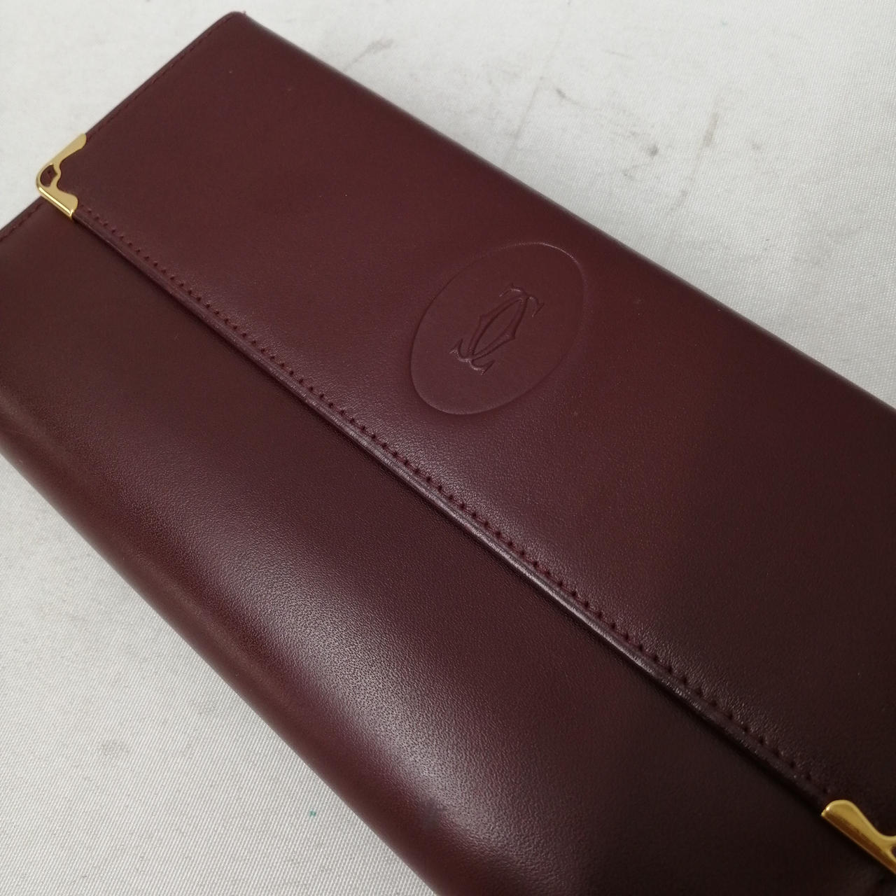 カルティエcartier ガマ口長財布 中古・古着通販】Cartier (カルティエ) マストラインがま口二