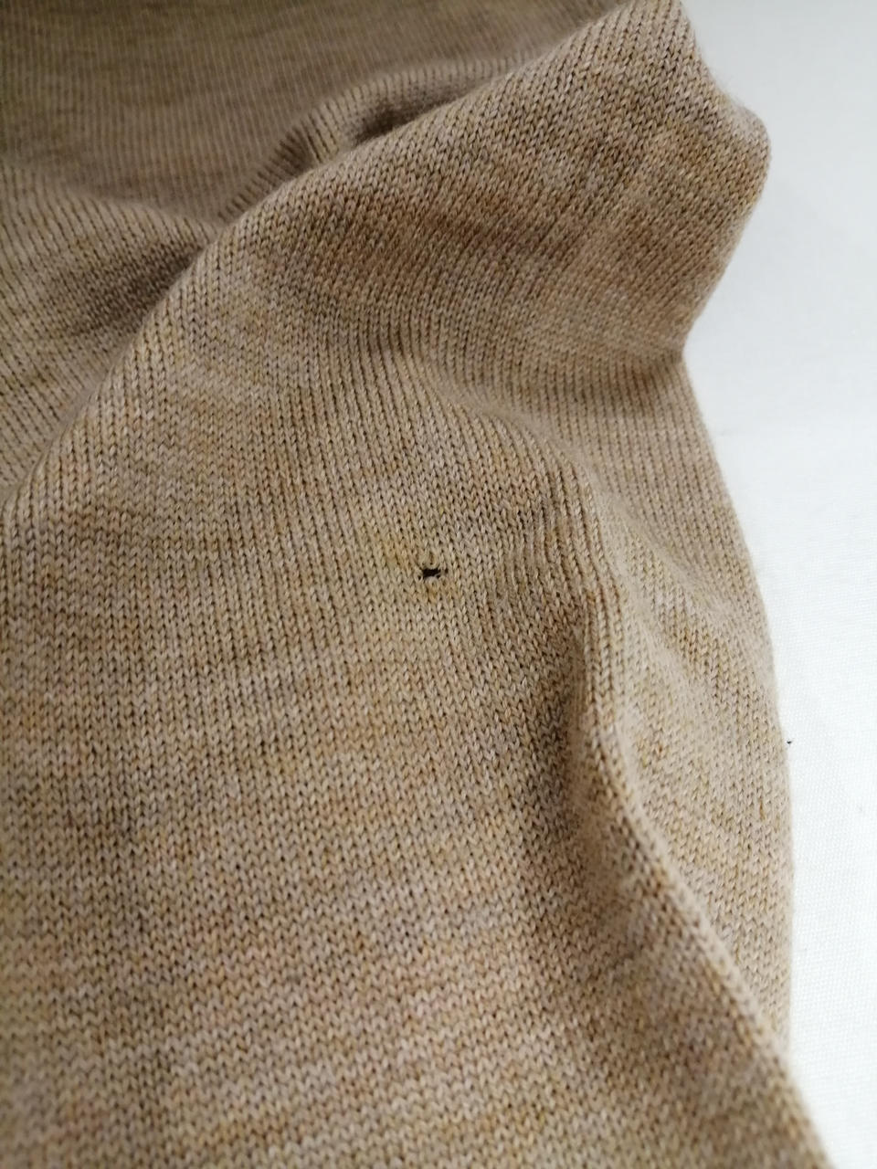 左袖穴空きあり