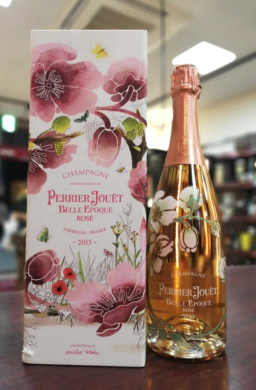 ボトル正面。箱付き。箱左下に破れあり。