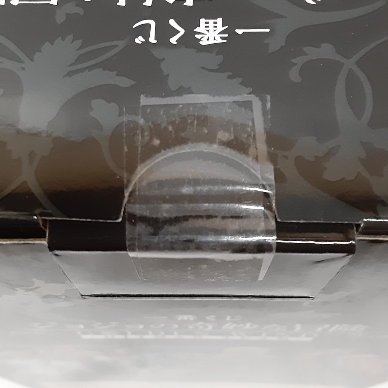 テープ二度貼り