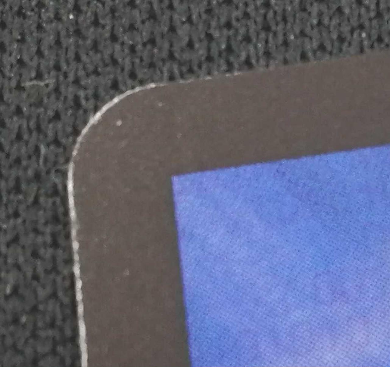 僅かに左上キズ有