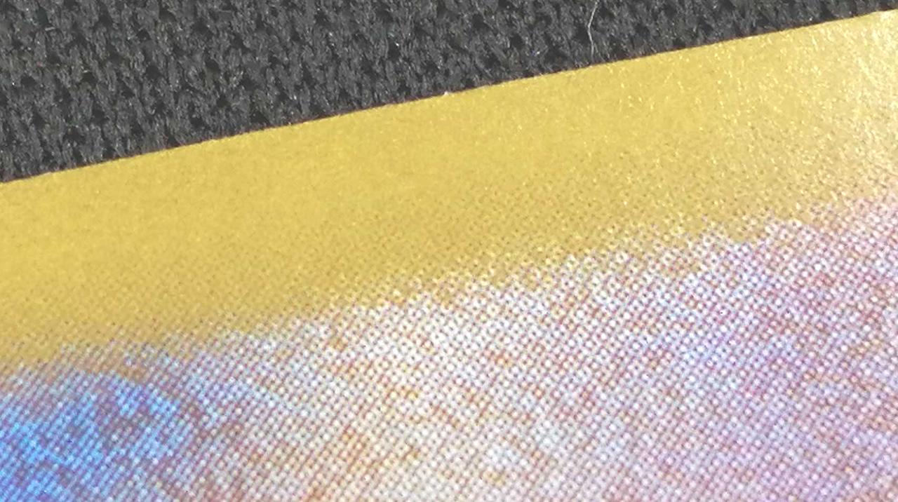 裏面上部白欠け有