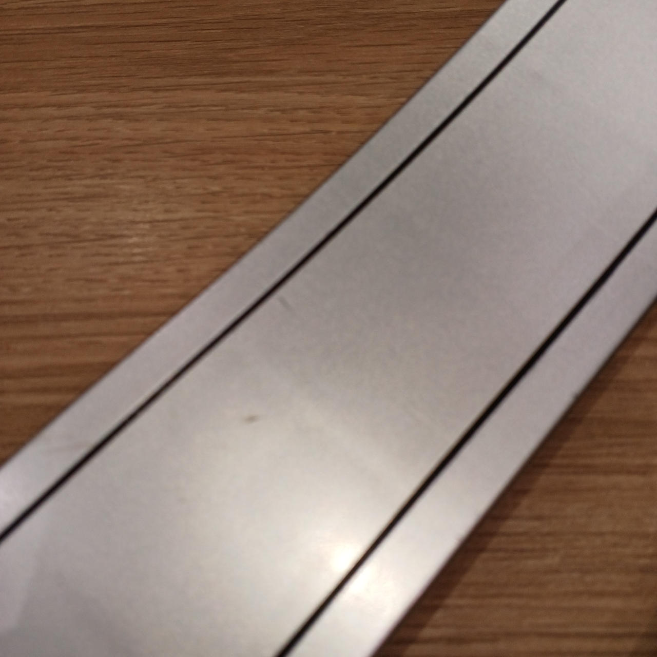 ベルトに傷あり