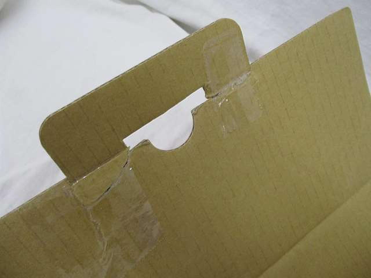 箱破れ補修痕あり