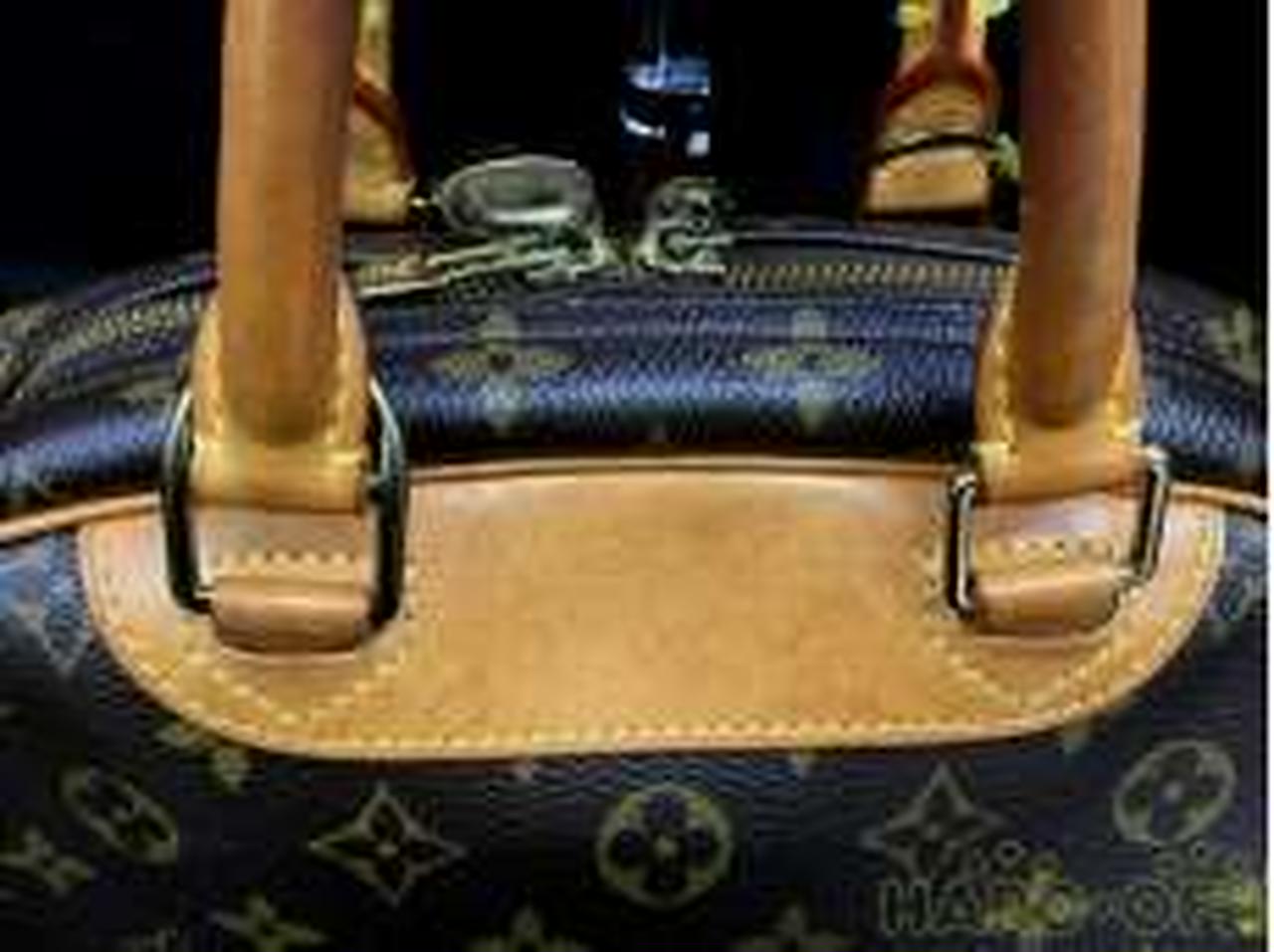 ヌメ革部分汚れあり。