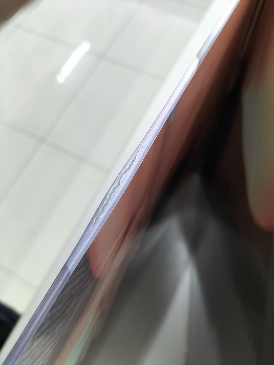 ジャケット下部破れ傷あり