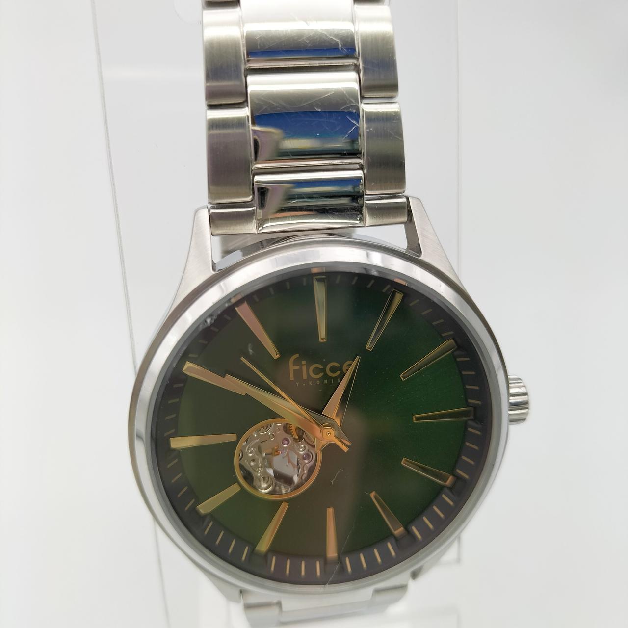 １１時の部分の風防とベゼルに傷あり、