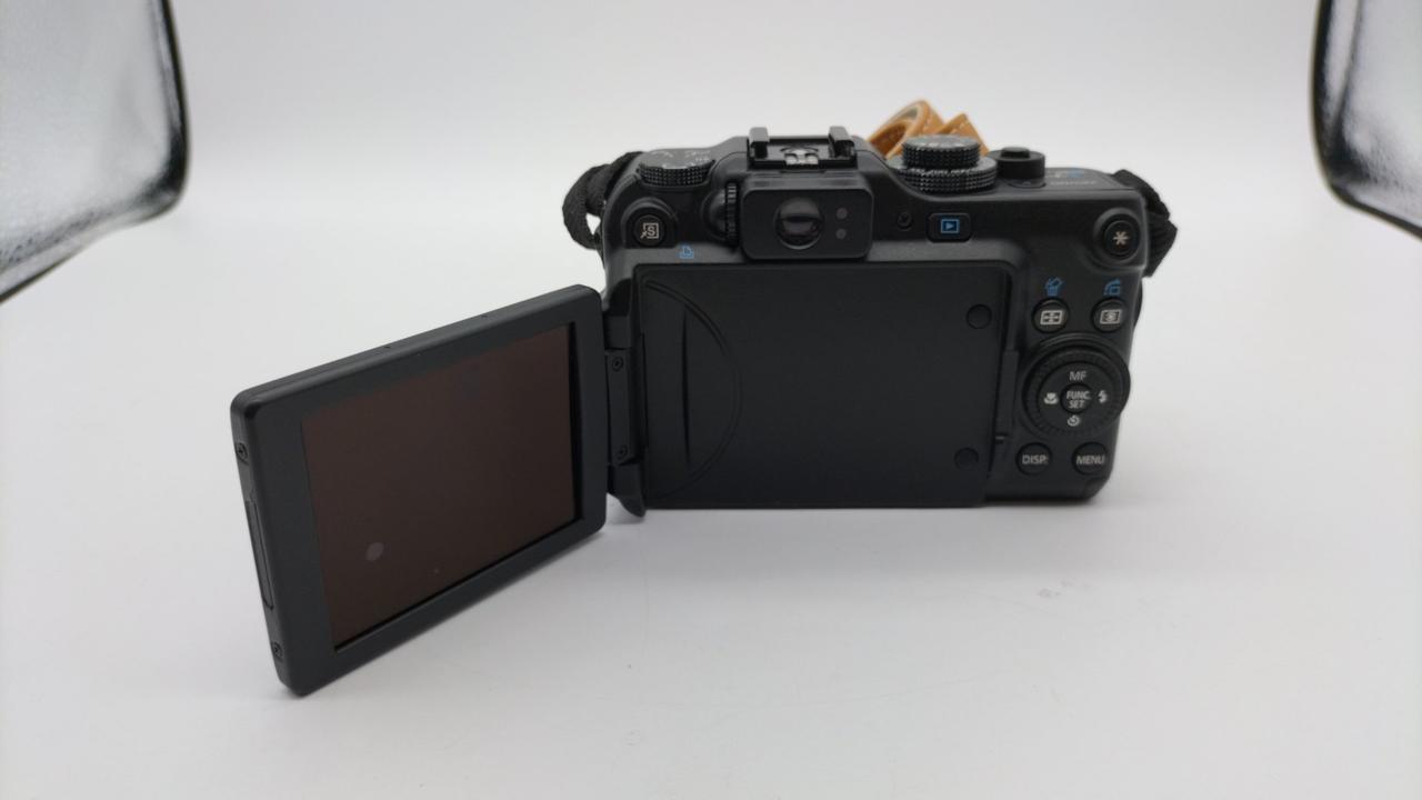 2) ジャンク品 Canon コンパクトデジタルカメラ PC1676 20140305110345_940_.jpg