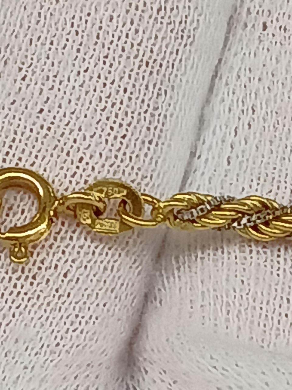 750刻印あり。