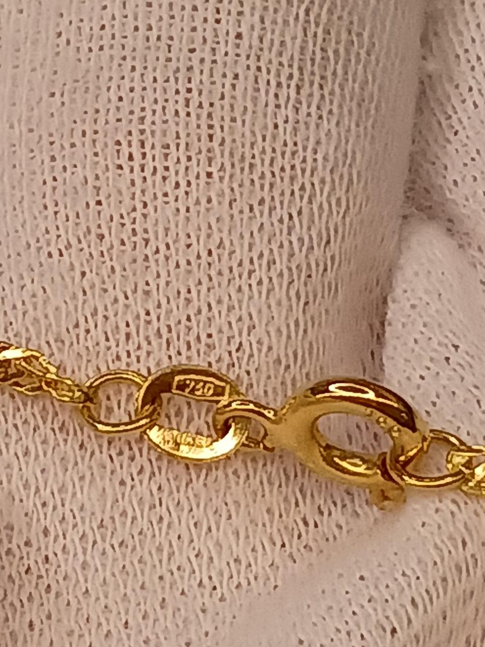 750刻印あり。