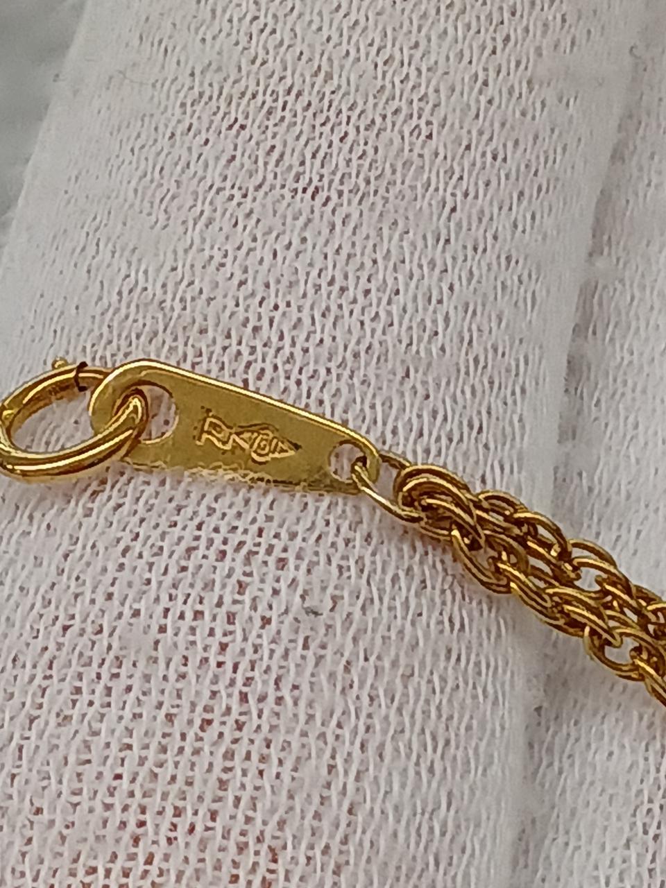 750刻印あり。