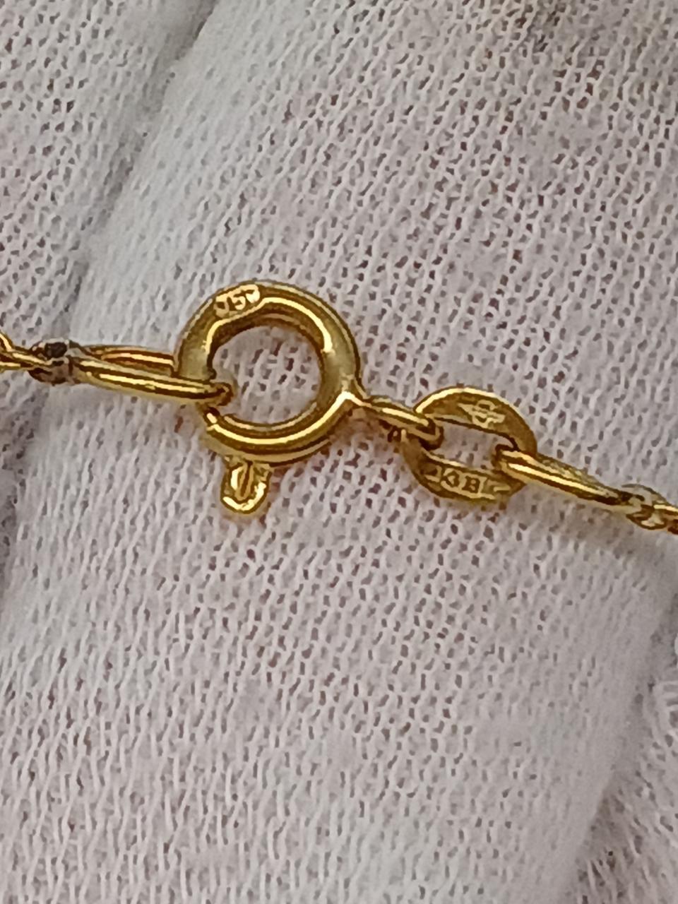 750刻印あり。