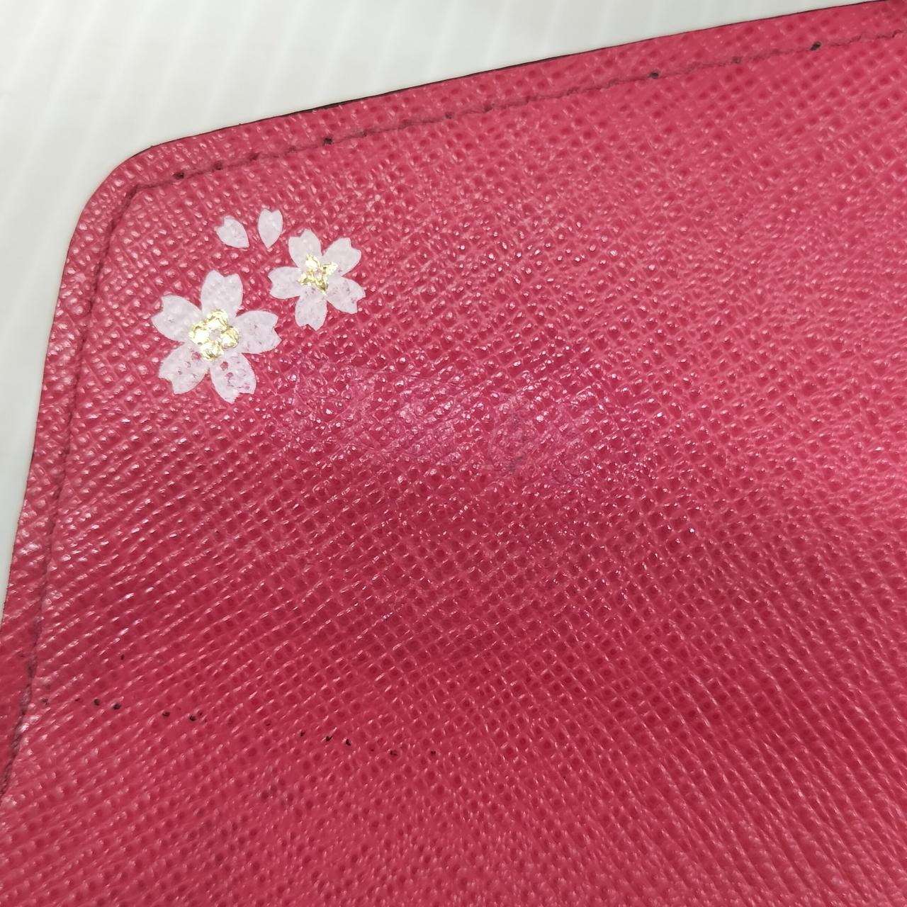 お花のプリントとイニシャルの消し跡あり